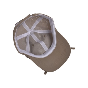Detail view of khaki quick-dry sun hat showing breathable mesh and internal stitching