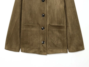 Detailed view of buttons and pockets on a dark brown faux suede jacket for women