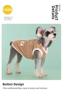 Detail showing the brown fleece texture and decorative white pom-poms on the pet vest