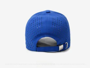 Detail of royal blue baseball cap back with laser-cut holes and silver metal buckle
