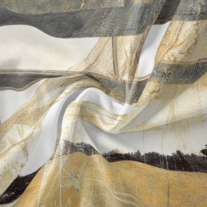 Macro detail of soft bohemian tapestry fabric showing delicate abstract art texture