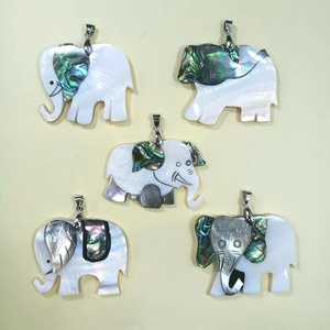 Handcrafted elephant shell pendants featuring colorful abalone and white mother of pearl