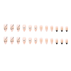 French nude almond press-on nails with cute puppy cartoon and black line art patterns