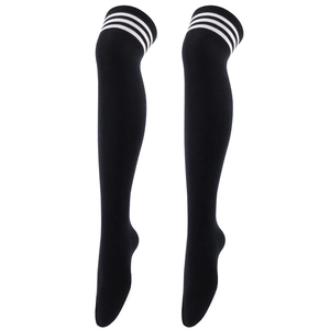 Detailed knit texture of black over-knee socks featuring classic white triple stripes