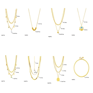 Gold plated titanium steel necklaces with various pendants like eye, star and pearl charms
