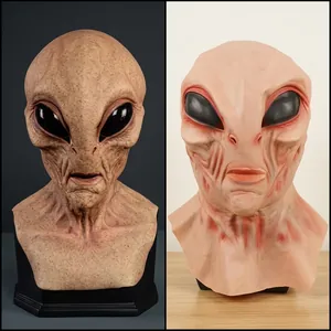 Realistic alien mask comparison showing side-by-side view of movie prop and actual product