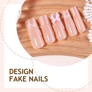 Extra long French press-on nails set with pink bows, pearls and heart crystals