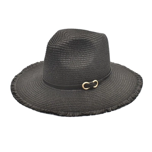 Foldable black straw sun hat with frayed brim and gold buckle leather band