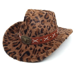 Detail of leopard print cowboy hat featuring a metal bull skull buckle and studded band