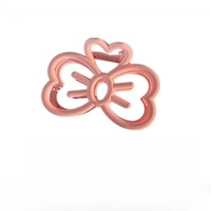 Elegant rose gold metal hair claw clip with clover and heart cut-outs for women