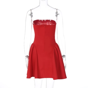 Detail view of red strapless mini dress with invisible back zipper and flared skirt hem