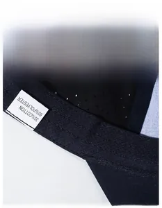 Detail of the mesh lining and wide moisture-wicking sweatband on a breathable cap