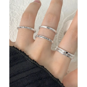 S925 sterling silver ring set with engraved lucky smile and heart patterns on white background