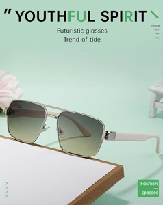 Detail of square silver metal sunglasses with gradient lenses on a mint green stand