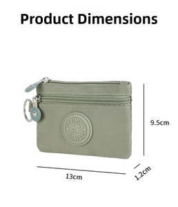 Detail view of mini nylon coin purse with dimensions 13x9.5x1.2cm and dual zippers
