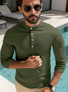 Detail of army green waffle knit polo shirt showing texture and buttoned Henley collar