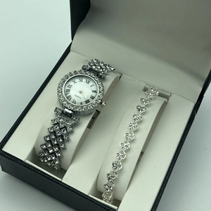 Elegant women's silver quartz watch and heart-shaped diamond bracelet set in a gift box