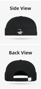 Detail view of cotton docker cap showing side horse embroidery and back adjustable strap