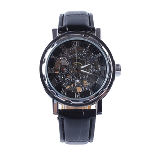 Detailed macro view of the mechanical watch skeleton dial with silver case and black leather strap