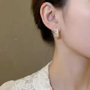 Elegant crown pearl earrings with sparkling zircons in a French vintage style for women