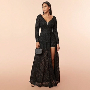 Detail view of black sequined V-neck dress with long sleeves and mesh split skirt