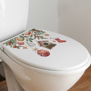 Festive Christmas toilet lid sticker featuring holly berries and birdhouse decor