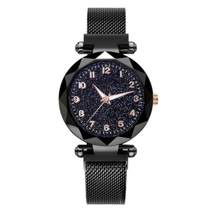 Detail showing starry sky dial with diamond-cut glass and magnetic Milanese strap