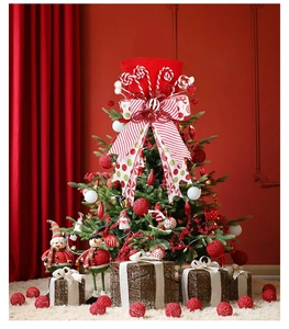 Detailed Christmas tree topper red hat with stripes bow and festive ornaments