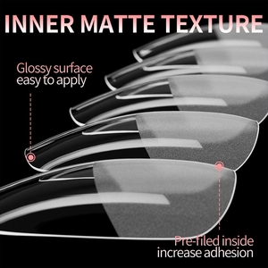 Detail of oval nail tips with glossy surface and pre-sanded inner matte texture for adhesion