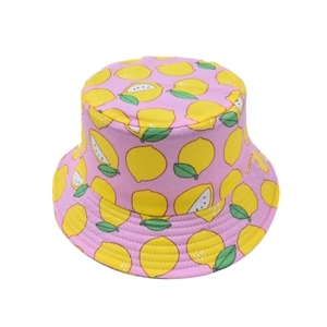 Close-up of pink cotton sun hat featuring cute yellow lemon prints and fine stitching