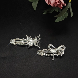 Exquisite silver alloy butterfly hair clips with cat eye stones and sparkling crystals