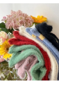 Close-up of colorful mink velvet socks showing soft knit texture and fluffy warm material