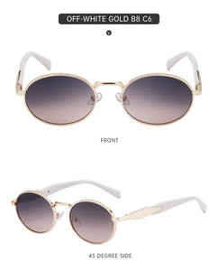 Detail view of round gold metal sunglasses with off-white tips and purple gradient lenses