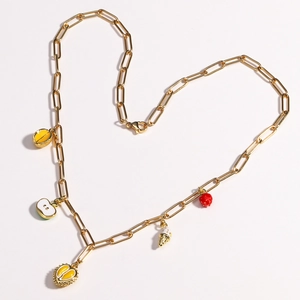Golden chunky chain necklace with colorful tropical fruit and ice cream charms in heart shape