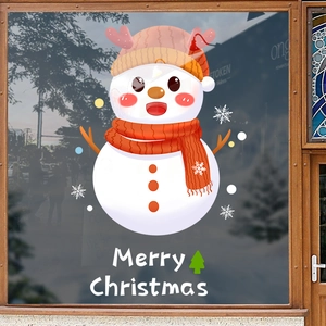 Christmas snowman window cling with reindeer hat and Merry Christmas text on glass