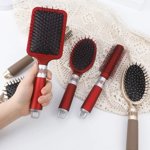 3-piece professional massage hairbrush set with ergonomic handles and gold finish