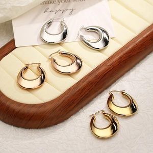 Detailed trio of gold, silver, and rose gold U-shaped minimalist chunky hoop earrings