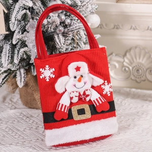 Detailed view of a red knitted Christmas gift bag featuring a 3D plush snowman and belt