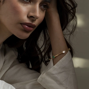 Elegant 18k gold plated stainless steel bracelet with green and clear zircon stones