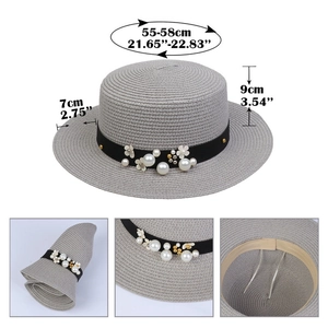 Detail of grey boater hat featuring pearl flower trim, foldable design and sweatband