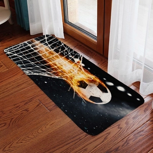 Absorbent flannel football soccer floor mat with fiery goal design on wooden floor