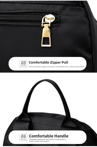 Close-up of golden zipper pulls and reinforced nylon handles on a black travel backpack