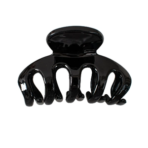 Minimalist glossy black claw clip hair accessory with high-shine finish on white background