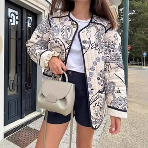 Women's vintage paisley quilted jacket in beige with contrast trim and button closure