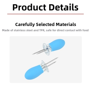 Detail of stainless steel corn holders with ergonomic blue TPR handles for BBQ