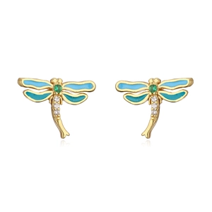 Macro detail of gold-plated dragonfly earrings with blue enamel and cubic zirconia