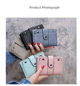 Detailed view of women's mini wallets in five colors with litchi grain texture and snap closure