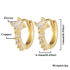 Detalle de pendientes de cobre de 14 mm con circón que muestra dimensiones y peso exacto