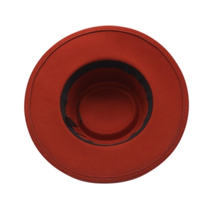 Macro shot of red felt fedora interior showing black sweatband and stitched wash label