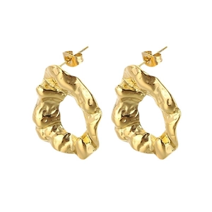 Golden irregular wrinkled hoop earrings with lava texture design in stainless steel